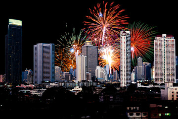 colorful fireworks on cityscape in the night as beautiful background concept