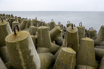 Concrete breakwater on the Baltic coast in Poland.