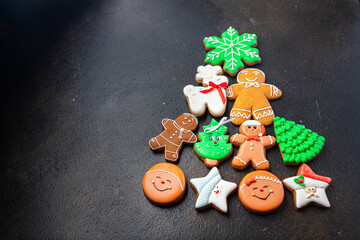 gingerbread on the table in the shape christmas tree cookies new year homemade cakes dessert christmas card new year copy space food background