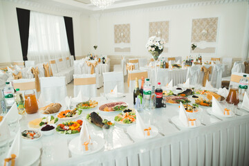 Interior of a restaurant prepared for wedding ceremony
