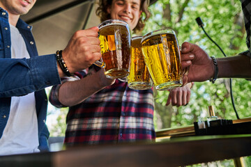 Close up photo of three glasses of beer.