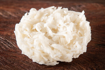 Cocada Coconut Candy on Rustic Wood Background