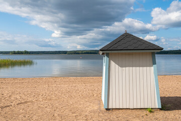 Wooden dressing room on the sandy shore of the sea, Tammisaari, Finland