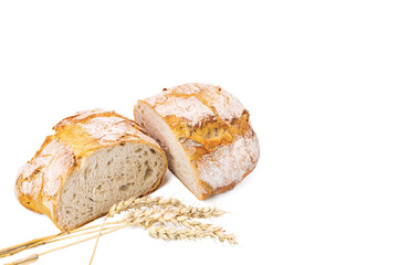 View of cut loaf white bread and wheat ears isolated on white background.  Food concept. Health concept. 