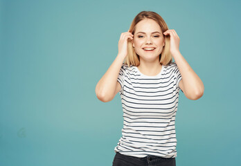 Fototapeta premium woman with displeased facial expression angry look blue background