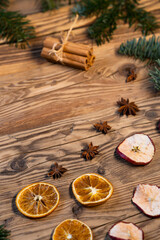 Obraz na płótnie Canvas Traditional Czech Christmas on wood decoration with twig, apple, orange, fruit