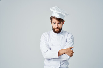 male cook work uniform profession kitchen light background