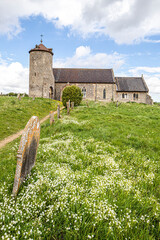 Springtime at St Andrews church dating back to Norman times in the village of Little Snoring,...