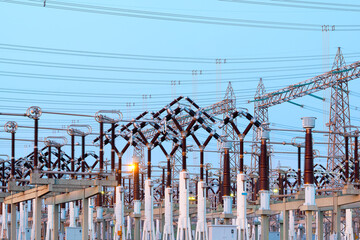 Detail of the equipment of an electric substation at dusk