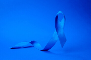 Prostate awareness. Awareness of men health in November with blue prostate cancer ribbon isolated...