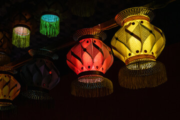 Different shaped & Vibrant colored lanterns displayed in market during festive season of Diwali in...