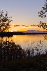 Naklejka na ściany i meble A Colourful Sunset at Astotin Lake, Elk Island National Park