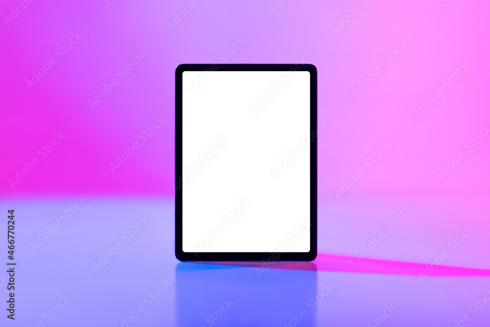 Poster modern tablet computer with mockup for application or website on blank white screen in neon light