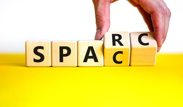 SPARC, special purpose acquisition rights company symbol. Cubes with words 'SPARC, SPAC' on beautiful white background, copy space. Business, SPARC, special purpose acquisition rights company concept.
