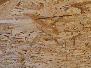 osb sheet pattern in blurred linear perspective, textured wood background of glued finishing...