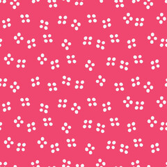 Pink seamless pattern with white dots.