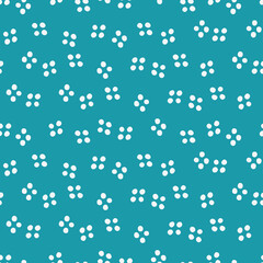 Blue seamless pattern with white dots.