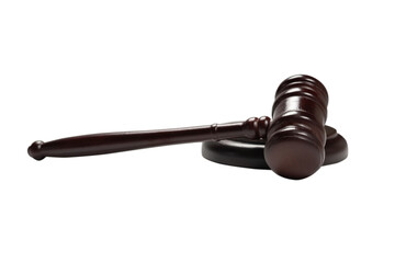 Wooden judge gavel and soundboard isolated on a white background.