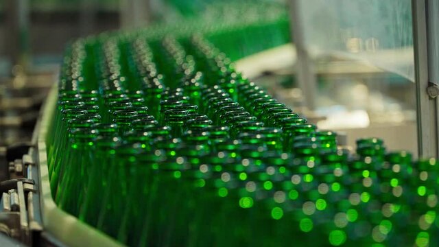 Many soda bottles on conveyor belt