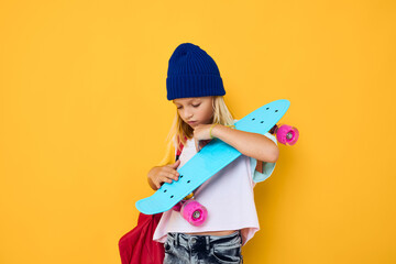 Fototapeta na wymiar teenager with a skateboard on his head Childhood lifestyle concept