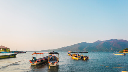 Fototapeta premium Fishing boats at the sunset in Honduras Central America
