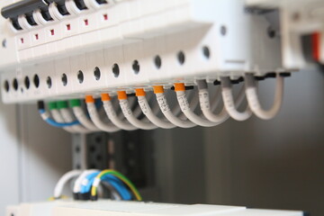 Connecting the equipment with a mounting wire in the electrical panel.