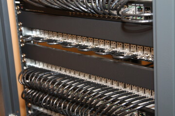 Connecting data switches to patch panels using RJ-45 patch cords.