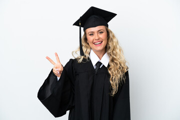 Young university graduate woman isolated on white background smiling and showing victory sign