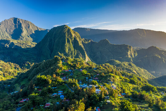 Aerial view of beautiful township among the mountains of Hell Bourg, Saint Benoit, Reunion.