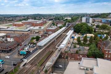 Aerial drone photo of the town centre of Wakefield in West Yorkshire in the UK showing the main train station in the town centre