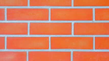 close up of orange brick wall texture