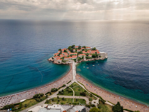 Aerial view of Sveti Stefan Peninsula, a small town in Mediterranean Sea in Balkans peninsula near Budva, Montenegro.