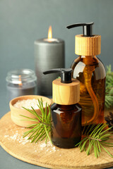 Composition with winter cosmetic products on light gray background