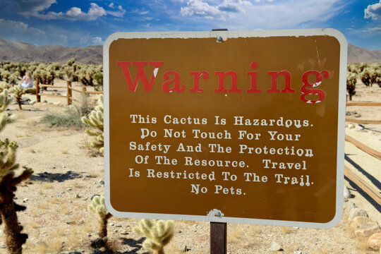 Warning sign at the Cholla Gardens in Joshua Tree National Park, California