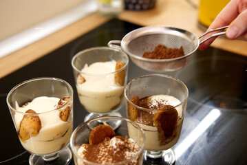 making tiramisu in glass