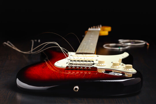 Replacing old strings on an electric guitar