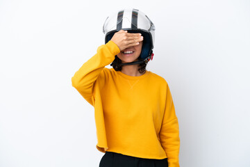 Woman with a motorcycle helmet covering eyes by hands. Do not want to see something