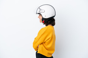 Woman with a motorcycle helmet in lateral position