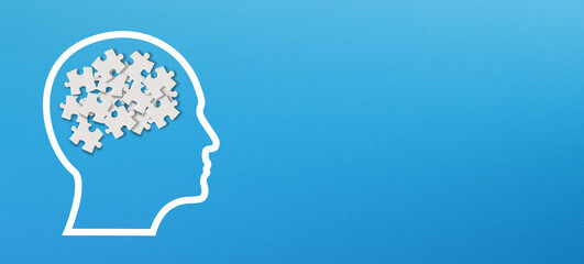 Confusion concept, mental health and problems with memory. Human brain shaped made of white jigsaw puzzles inside your head