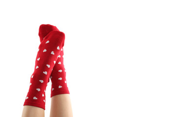 Female legs in red socks with hearts isolated on white