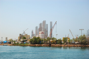 Oil drilling site at the shore, Sharjah, UAE - 466795810