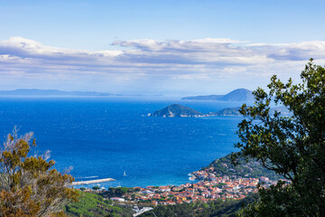 View over the houses and hills of Marciana Marina on the coast of the island of Elba