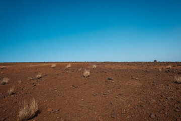 stone desert landscape with blue sky background