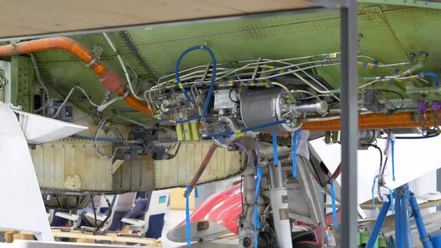 Close up detailed view of an airplane hydraulic system during maintenance