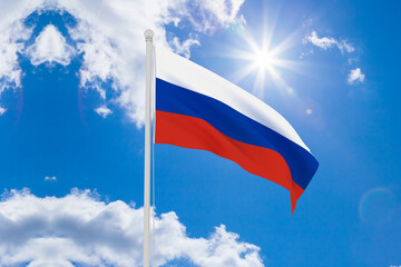 Russian flag waving in beautiful sky. Flag of Russian waving in the wind, sky and sun background. Russian Flag. UHD. 