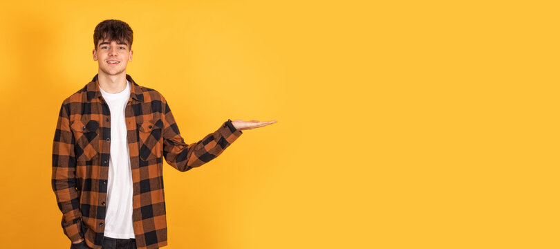 isolated student pointing to space