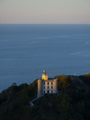 Fototapeta na wymiar Sunset at the Faro de la Plata lighthouse, Monte Ul?a, Euskadi