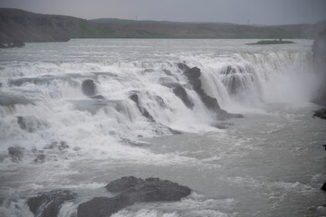 Landscape of plant growing in mineral build up at Geysir Golden Circle Iceland