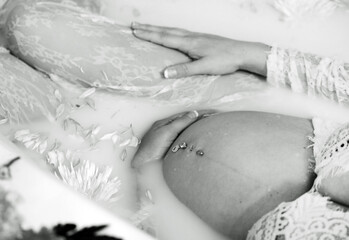 pregnant belly in bath