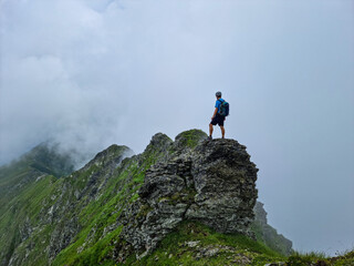 person on the top of a mountain,  Netedu Ridge, Fagaras Mountains, Romania 
